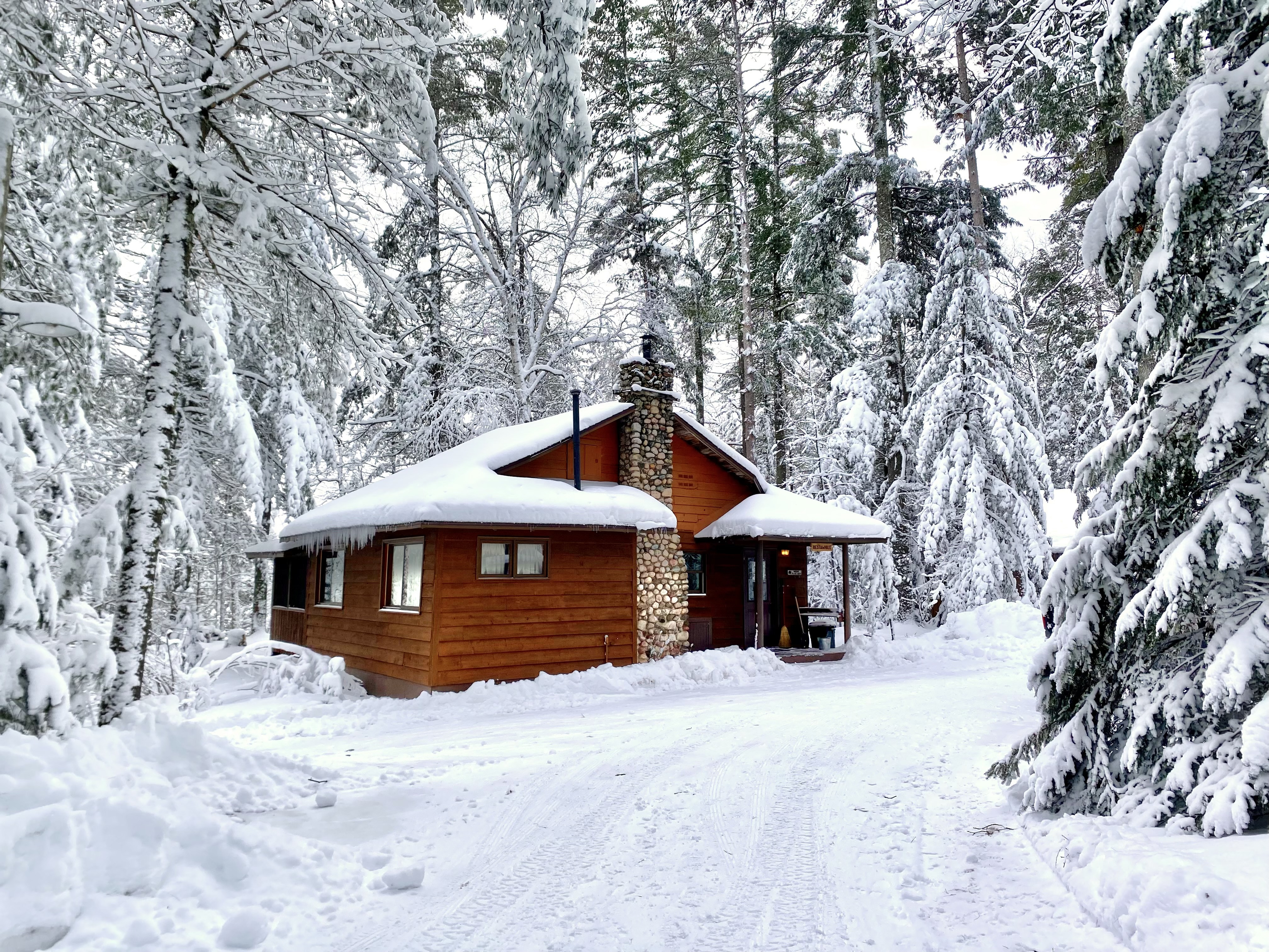 Restawhile 2-bedroom cabin in fresh Northern Wisconsin snow at Black’s Cliff Resort